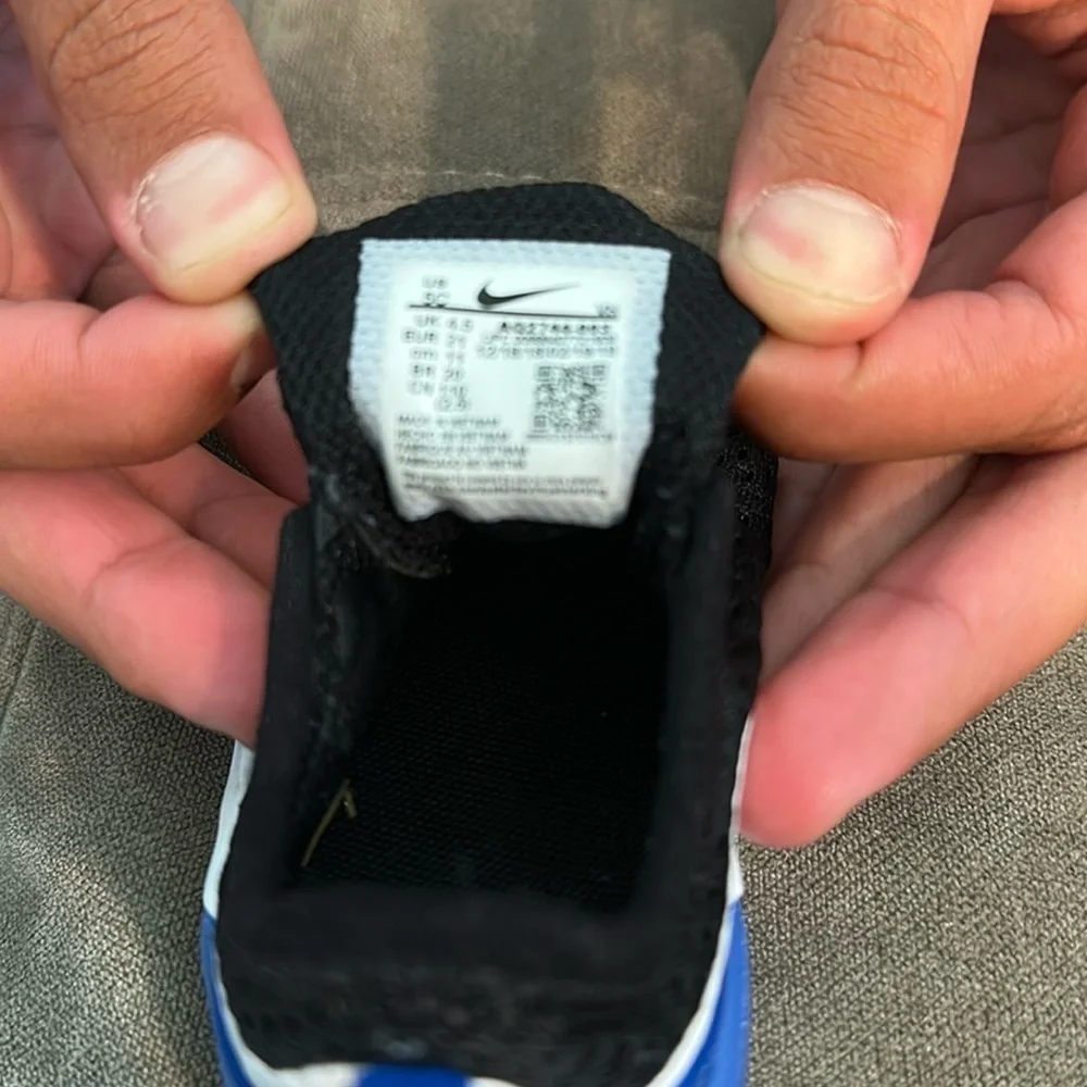 Nike Black and Blue Sneakers with Elastic Laces and Breathable Mesh
